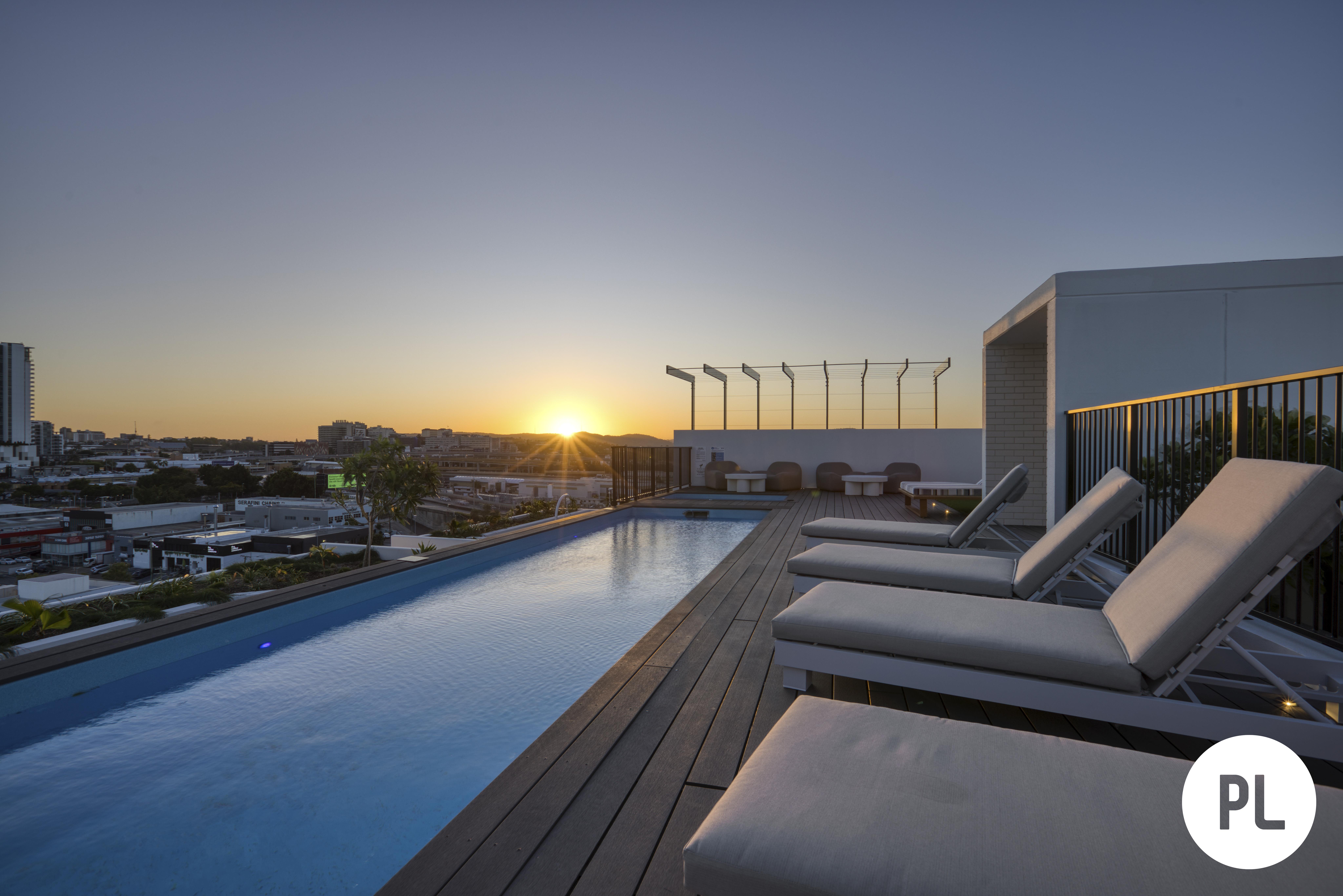 View of Stylish fully-furnished apartment with gym and stunning rooftop ...